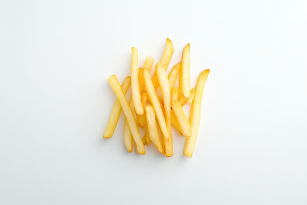 A pile of golden french fries on a white background