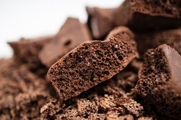 Pile of grated porous chocolate for confectionery