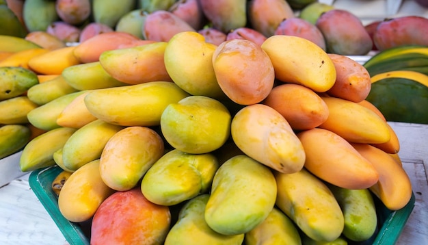 A pile of mangoes at a market