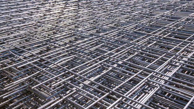 Photo pile of many prefabricated steel wire mesh for floor pouring work in construction site