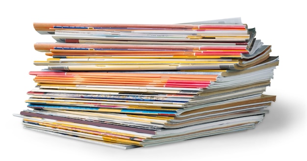 Pile of newspapers on white background