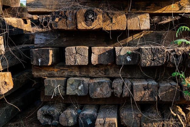 Pile of old wooden railway sleepers.