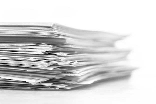 Pile of paper documents on background, close