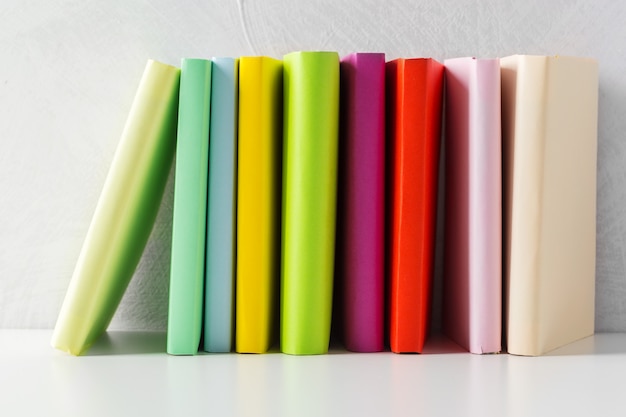  pile of paperback books on a table