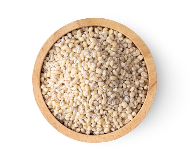 Pile of pearl barley isolated on white background