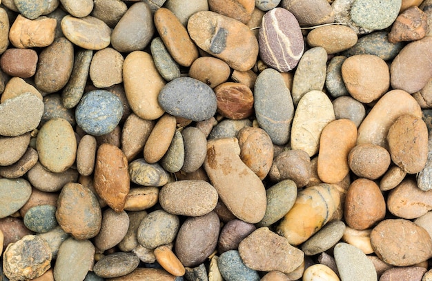 A pile of rocks is shown with the word rock on it.