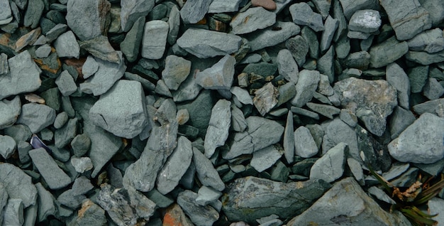 A pile of rocks with the word rock on it