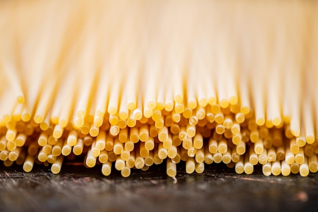 A pile of spaghetti dry on the table