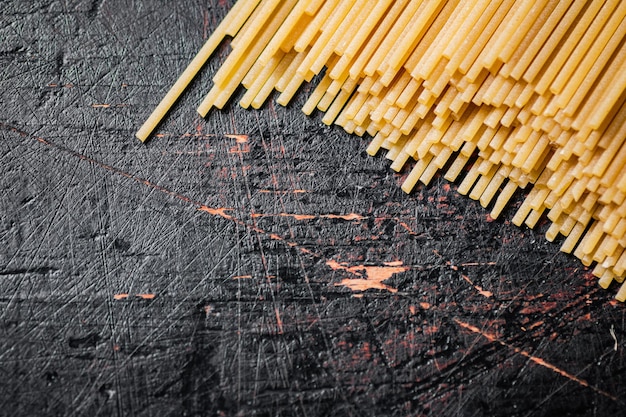 A pile of spaghetti dry on the table