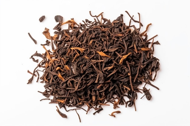 a pile of tea leaves on a white surface