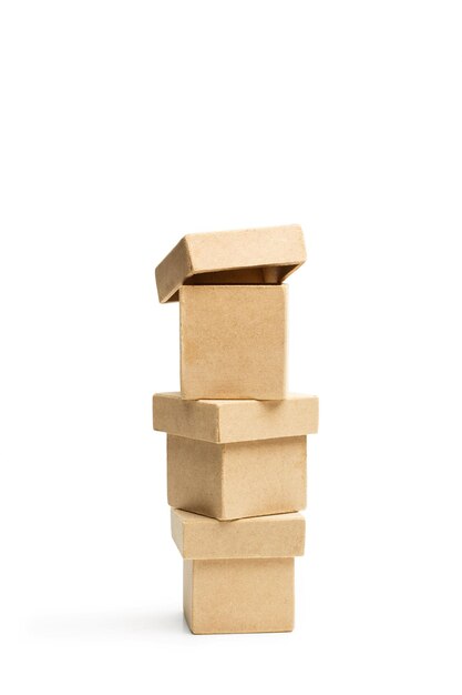 A pile of three plywood boxes on a white background with copy space