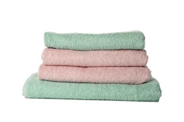 Pile of towels isolated on white table