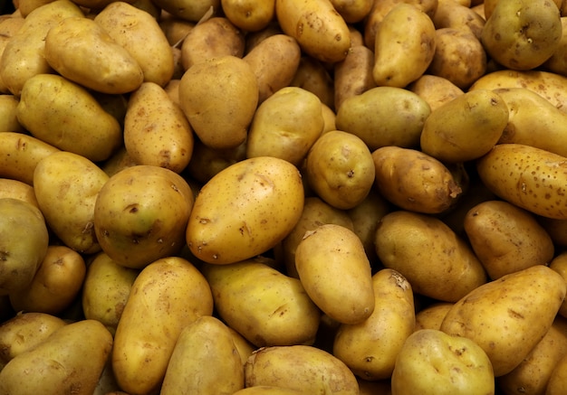 Pile of Uncooked Potatoes, with Selective Focus for Background