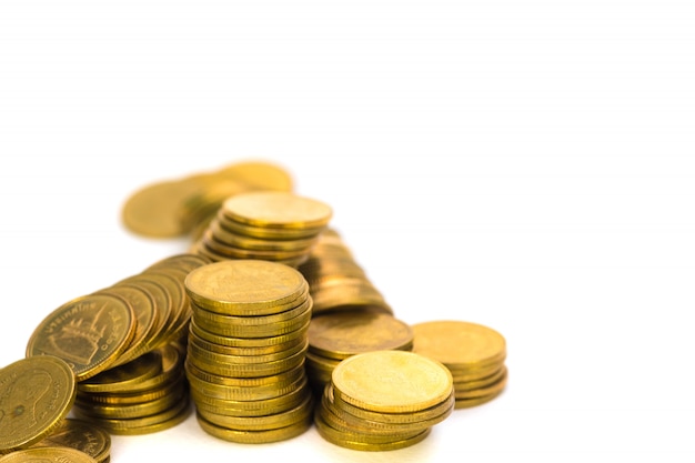 piles of coins on white