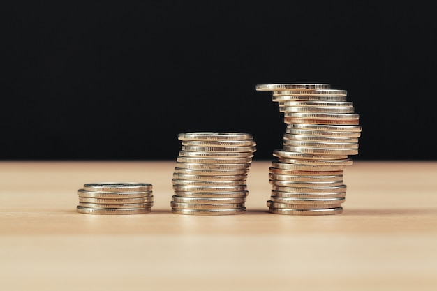 piles of coins on working table