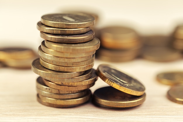 piles of coins on working table