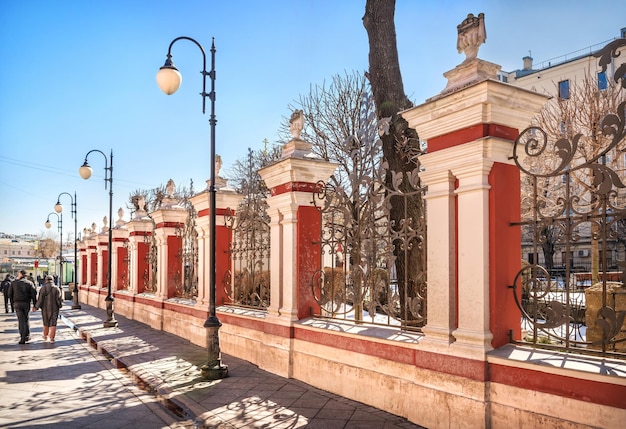 Pillars and monograms of the fence at St Clement's Church on Pyatnitskaya Street Moscow