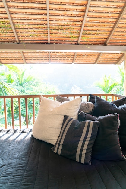 Pillow on sofa on balcony