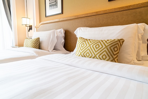 pillows decoration on bed in hotel bedroom