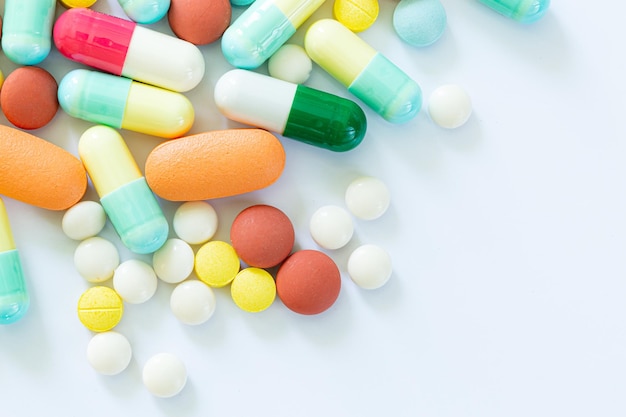 Pills and capsules on a white background,Different colorful pills on white background