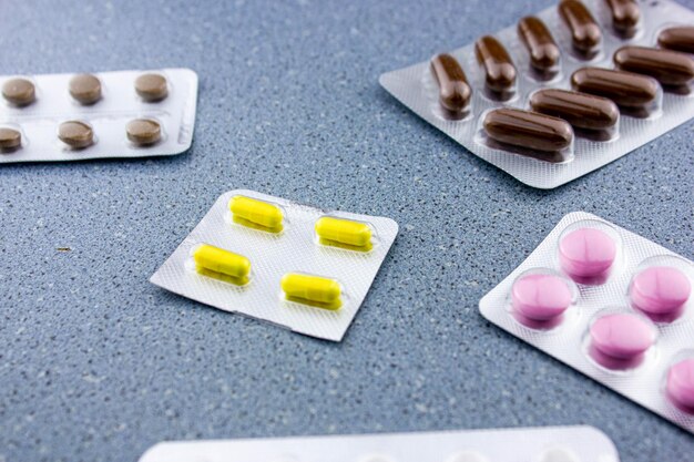 Pills closeupPills medical capsules on the background of pills in packages