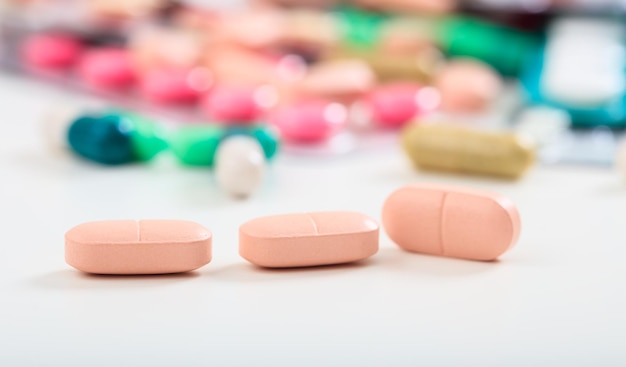 Pills on white background