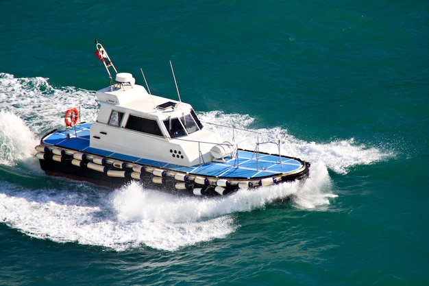 Pilot boat in action in the mediterranean sea