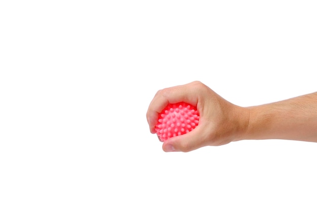 Pimply pink ball in hand concept cellulite development