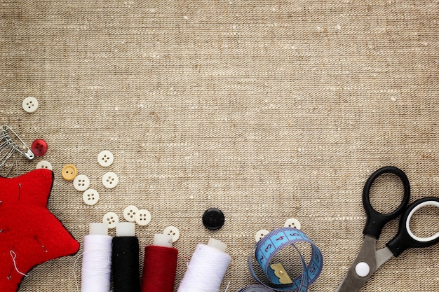 Pin cushion with needles, thread