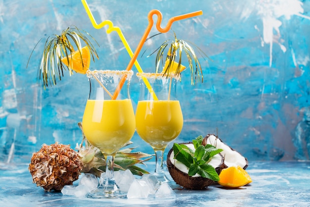 Pina colada cocktail and ingredients