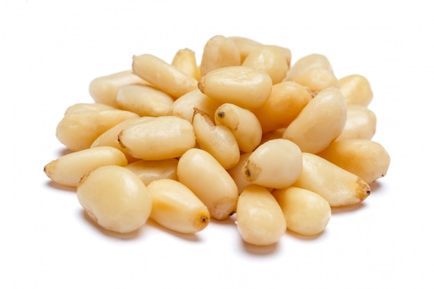 Pine nuts on white