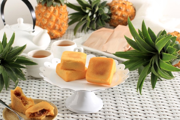 Pineapple Cake Pastry Taiwanese Famous Sweet Delicious Dessert Food with Tea and Fresh Pineapple