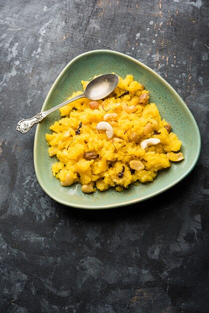 Pineapple sheera or Halwa also known as Ananas keshri shira. Popular South Indian Dessert recipe. selective focus