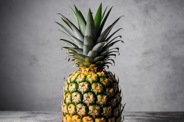 a pineapple with a green stem and yellow leaves on it