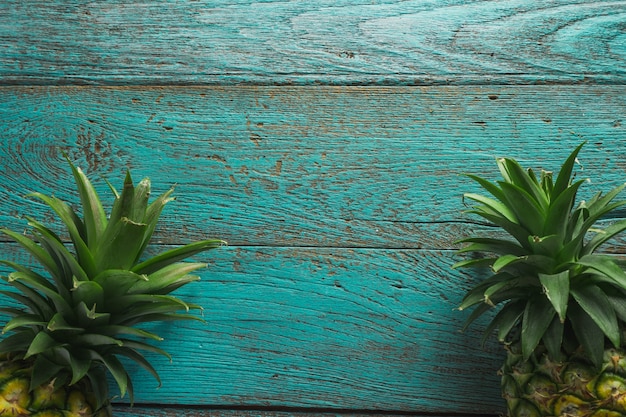 pineapple on the wood texture background