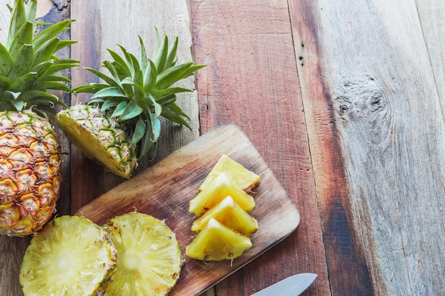 pineapple on the wood texture background