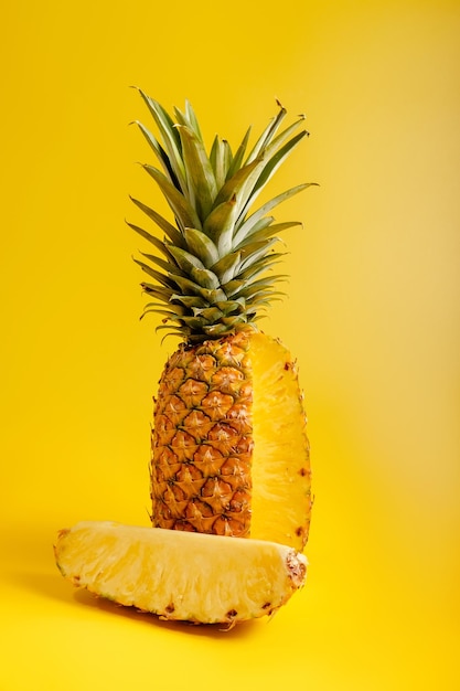 Pineapple on yellow background