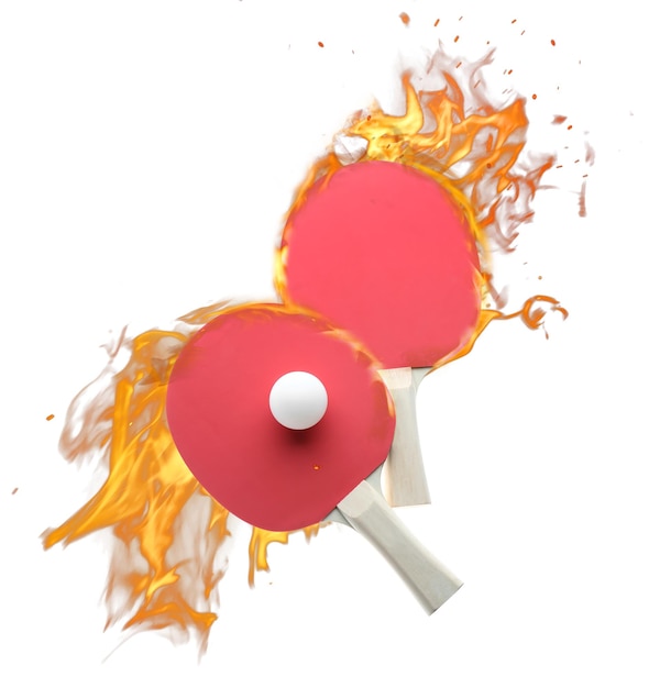 Ping pong rackets and ball in fire on white background