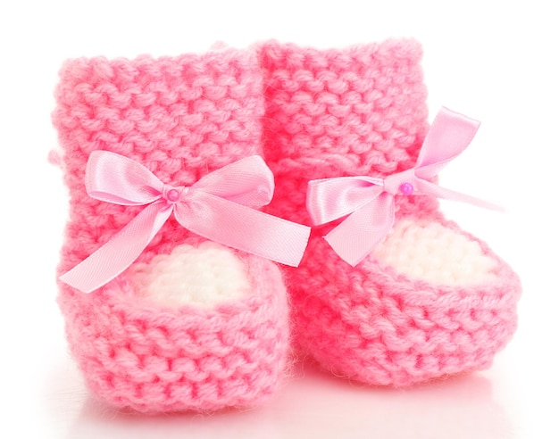 Pink baby boots isolated on white