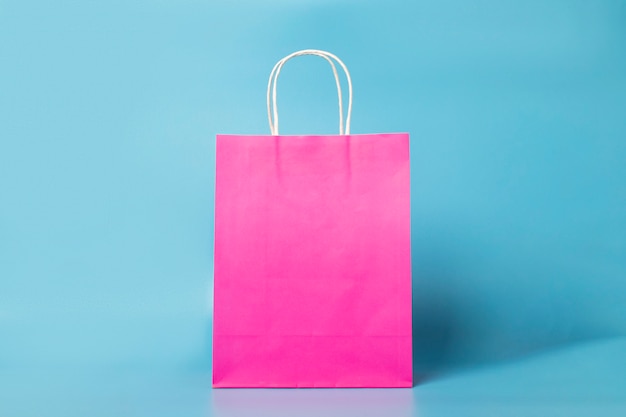 Pink bag on a blue