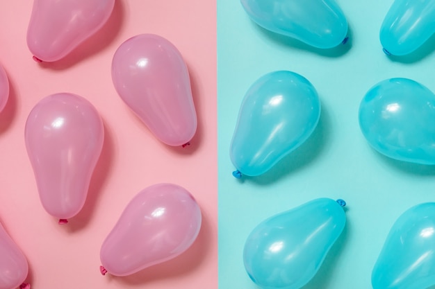 Pink and blue balloons background. Gender reveal party, boy or girl. Gender equality concept.