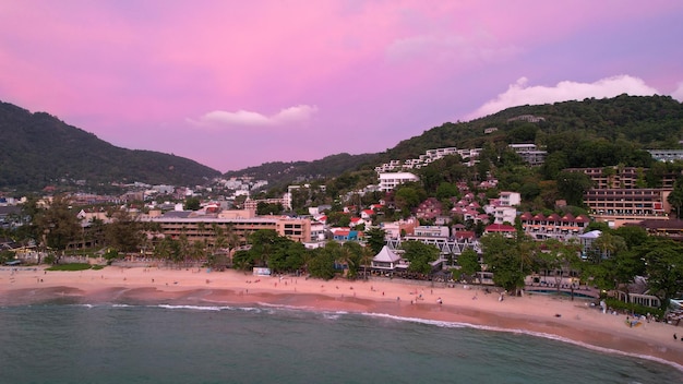 Pink and blue sunset with a view of the beach