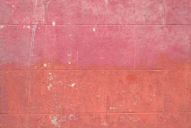 Pink brick wall texture. Concrete grungy background.