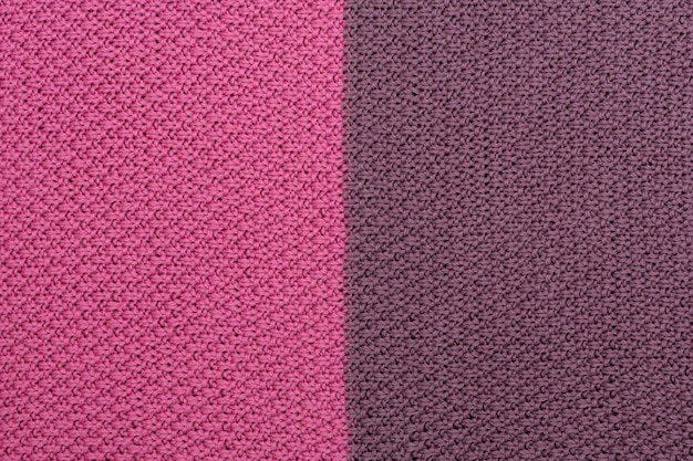 Pink and brown knitted fabric pearl woolen background The structure of the fabric with a natural texture Fabric background Knitted woolen background