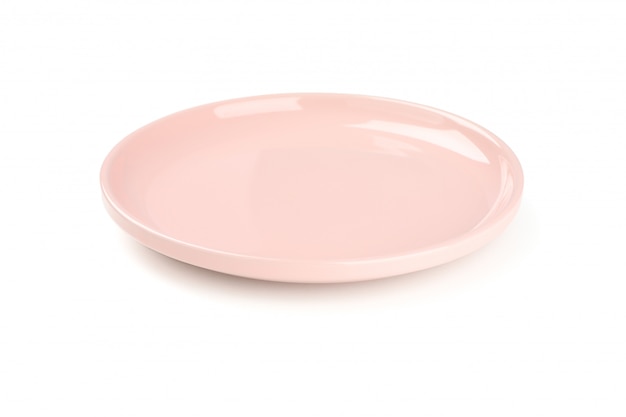 Pink clean plate isolated on white. Kitchen, serving