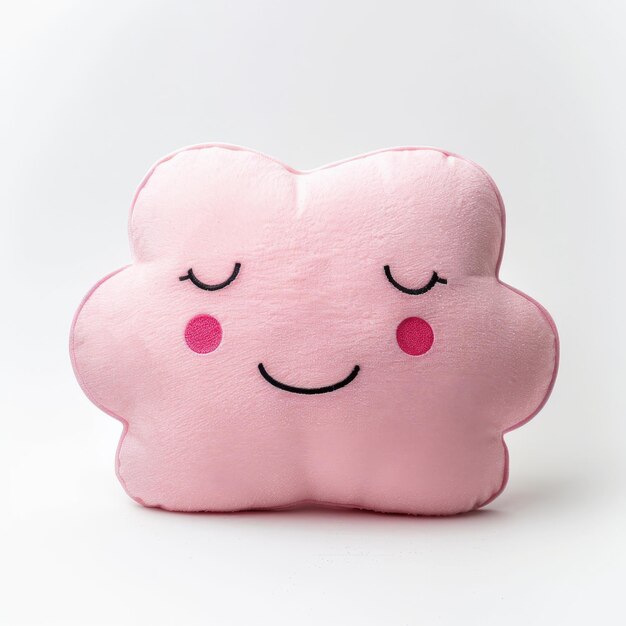 Photo a pink cloudshaped plush pillow with a smiling face and closed eyes