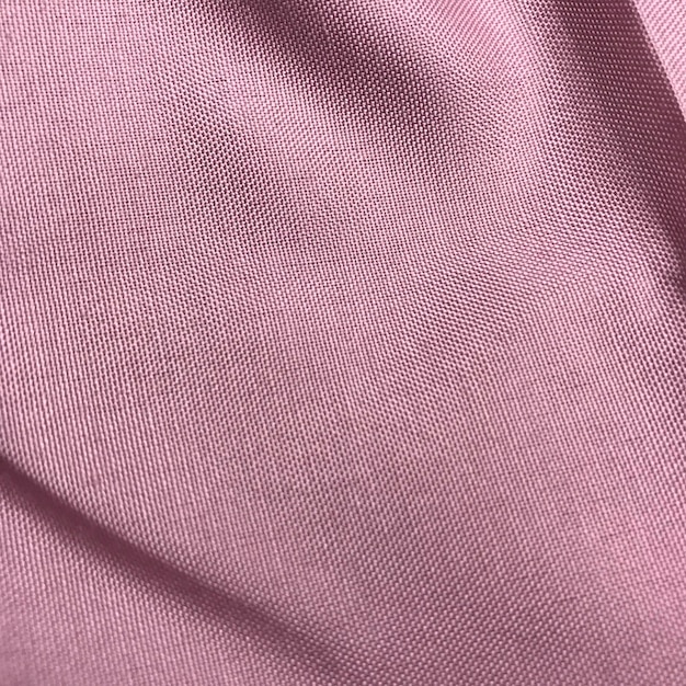 pink and cream fabric close up texture