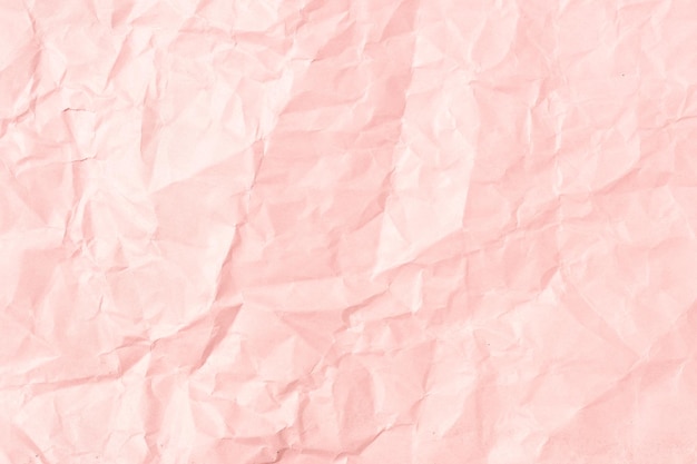 Pink crumpled paper background texture Full frame