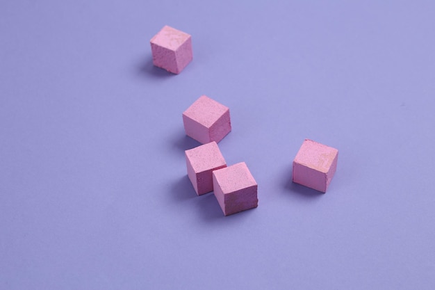 Pink cubes on a pastel purple background Geometric shapes Minimalism