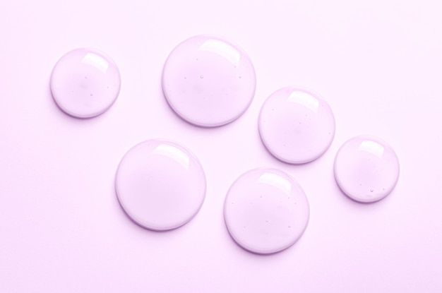 Pink drops of moisturizing gel or serum Cosmetic product for skin care